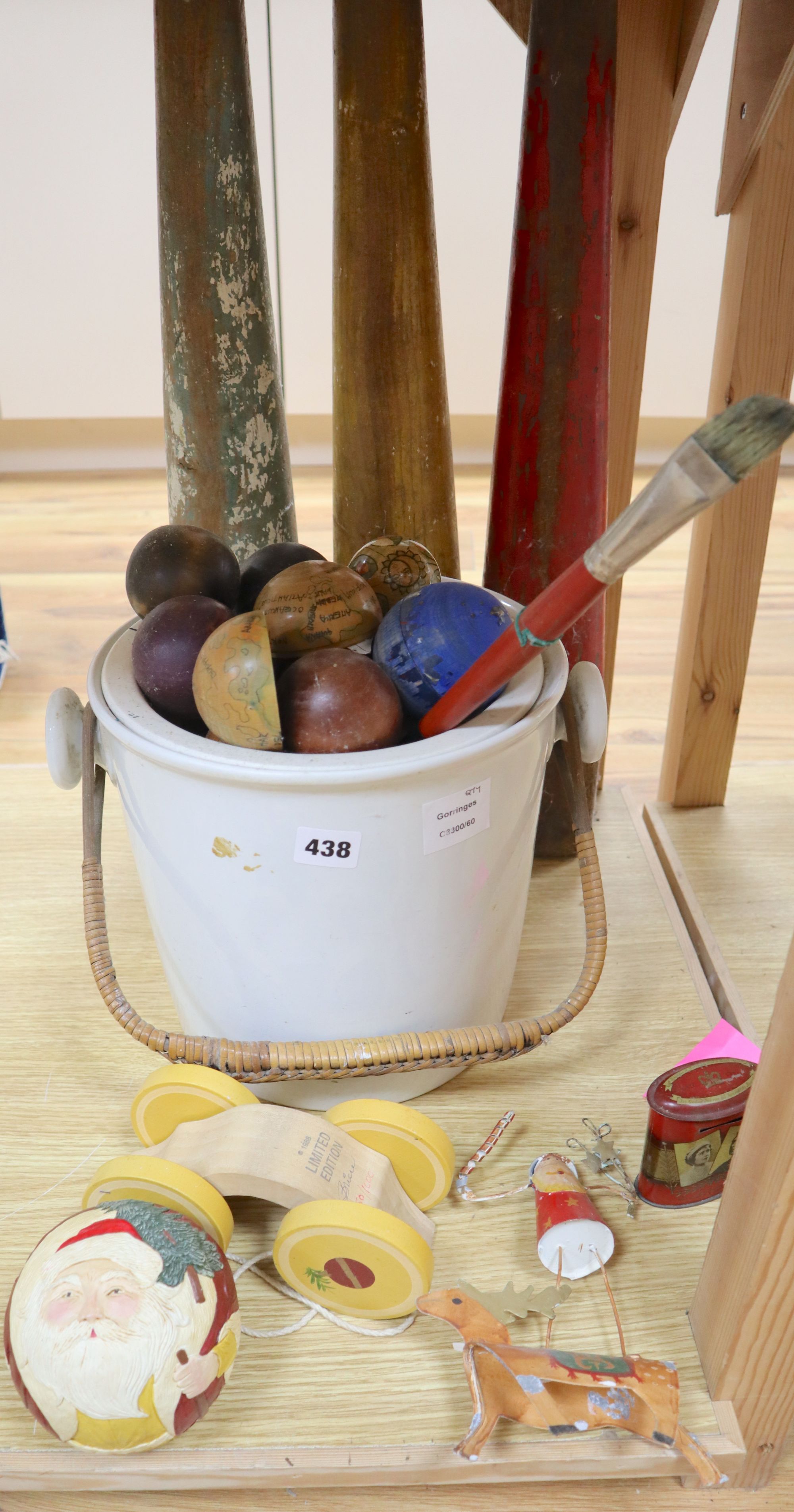 A group of mixed collectables to include three painted wood skittles